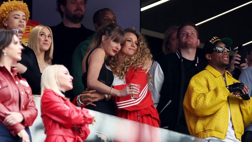 LAS VEGAS, NEVADA - FEBRUARY 11: Rapper Ice Spice, Singer Taylor Swift and Actress Blake Lively hug prior to Super Bowl LVIII between the San Francisco 49ers and Kansas City Chiefs at Allegiant Stadium on February 11, 2024 in Las Vegas, Nevada. (Photo by Ezra Shaw/Getty Images)