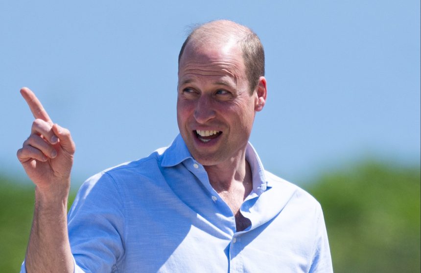 Prince William smiling on Fistral Beach