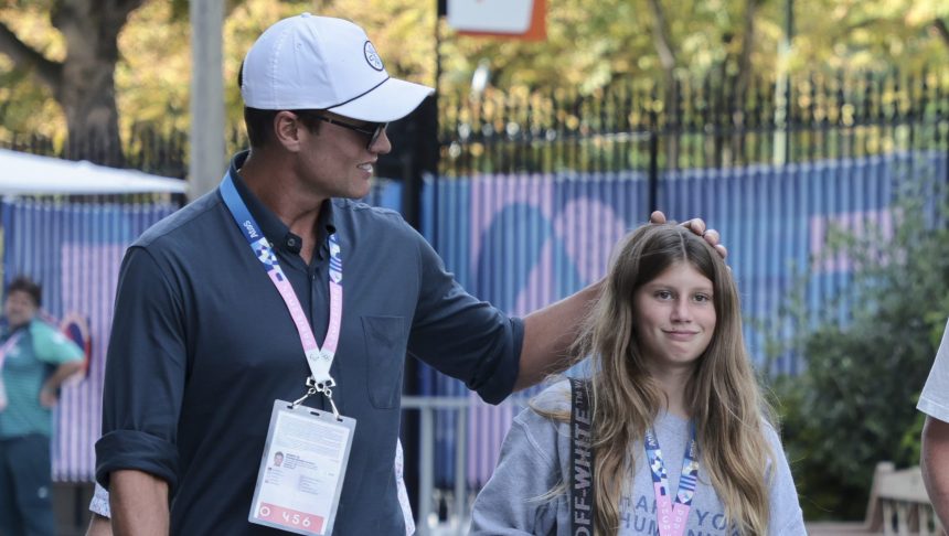 PARIS, FRANCE - AUGUST 4: Tom Brady and daughter Vivian Brady attend the men's tennis final between Novak Djokovic of Serbia and Carlos Alcaraz of Spain on day nine of the Olympic Games Paris 2024 at Roland-Garros Stadium on August 4, 2024 in Paris, France. (Photo by Jean Catuffe/Getty Images)