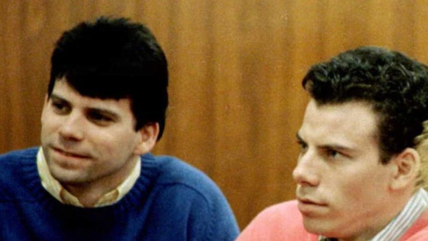 LOS ANGELES, UNITED STATES: This 1992 file photo shows double murder defendants Erik (R) and Lyle Menendez (L) during a court appearance in Los Angeles, Ca. The Menendez brothers have been found guilty of first degree murder 20 March in their second trial for the killing of their parents. AFP PHOTO Mike NELSON/mn (Photo credit should read MIKE NELSON/AFP via Getty Images)