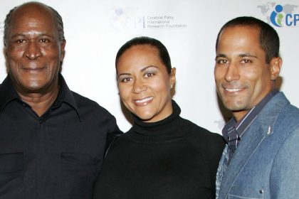 LOS ANGELES, CA - DECEMBER 03:  Granddaughter Quiera Williams, honoree actor John Amos, his daughter Shannon Amos, and son K.C. Amos arrive at the 1st Annual "A Celebration of Heroes" Power Heroes Gala at the Four Seasons Hotel on December 3, 2008 in Los Angeles, California.  (Photo by Brian To/FilmMagic)