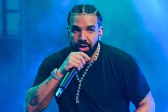 ATLANTA, GA - DECEMBER 9: Rapper Drake performs onstage during "Lil Baby & Friends Birthday Celebration Concert" at State Farm Arena on December 9, 2022 in Atlanta, Georgia. (Photo by Prince Williams/Wireimage)